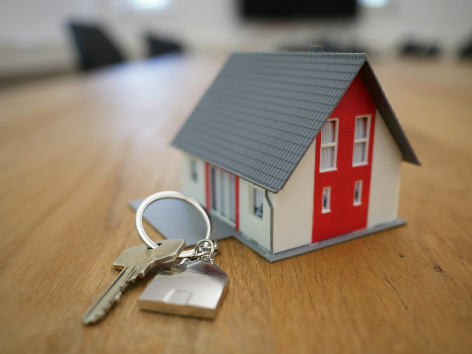 Prospective buyer reviewing property plans with an advisor